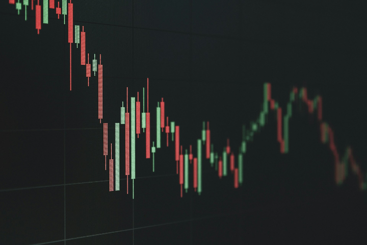 Stock market chart shows a declining trend.